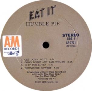 Columbia Records pressing from 1973 with dark gold background. The album is one of the earliest A&amp;M Records to use custom typography on the label.