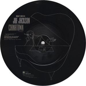 Joe Jackson: Real Men Britain 7-inch picture disc